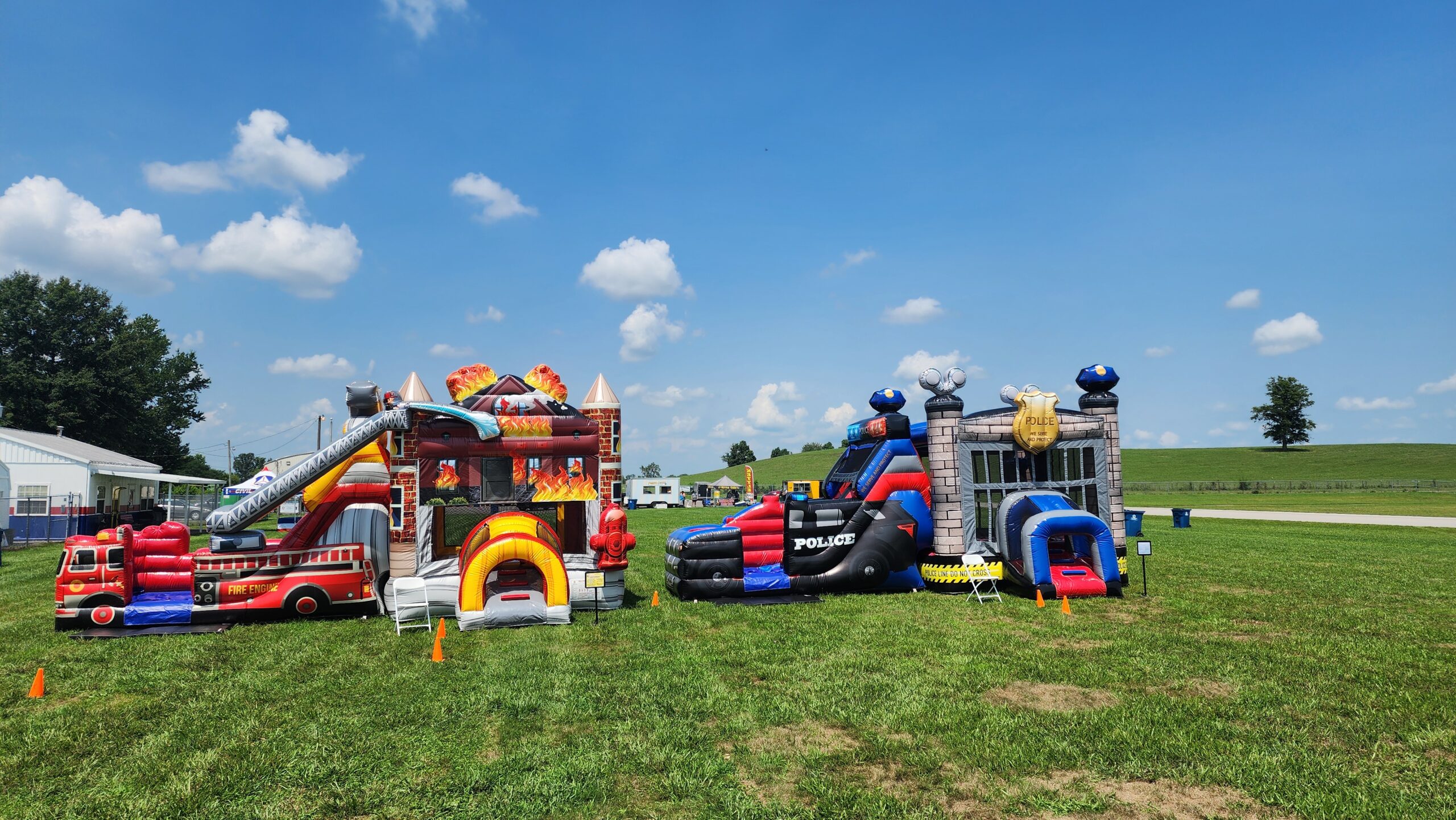 Two bounce houses at a community church event