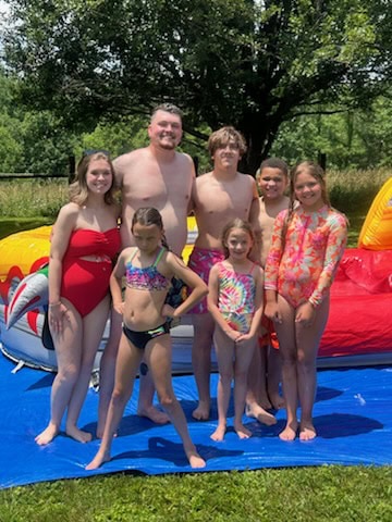 Inflatable water slide rental in Danville, KY set up by Backyard Responders for a big summer event