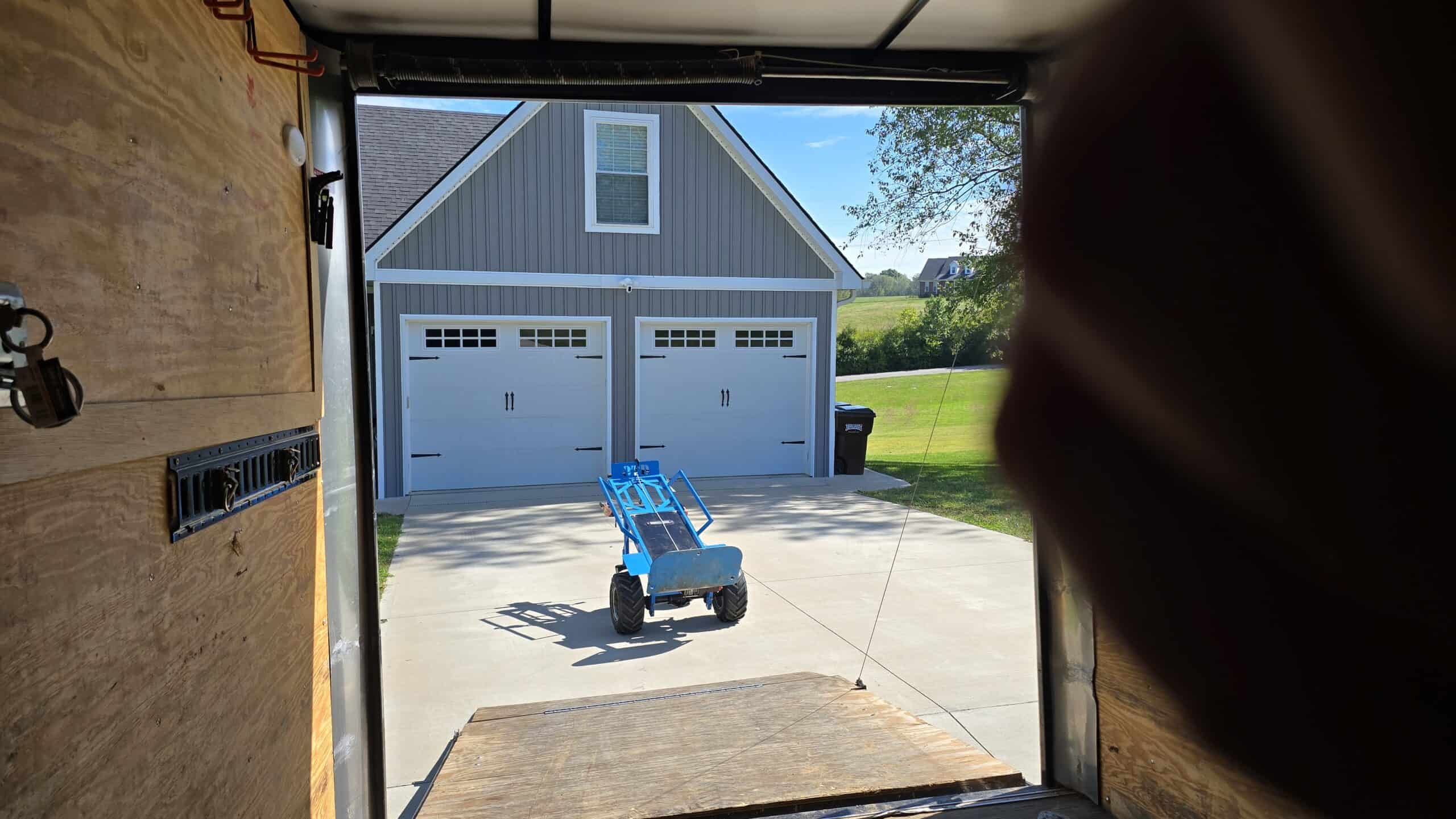 Professional inflatable bounce house rental pickup using dolly after party in Lexington KY