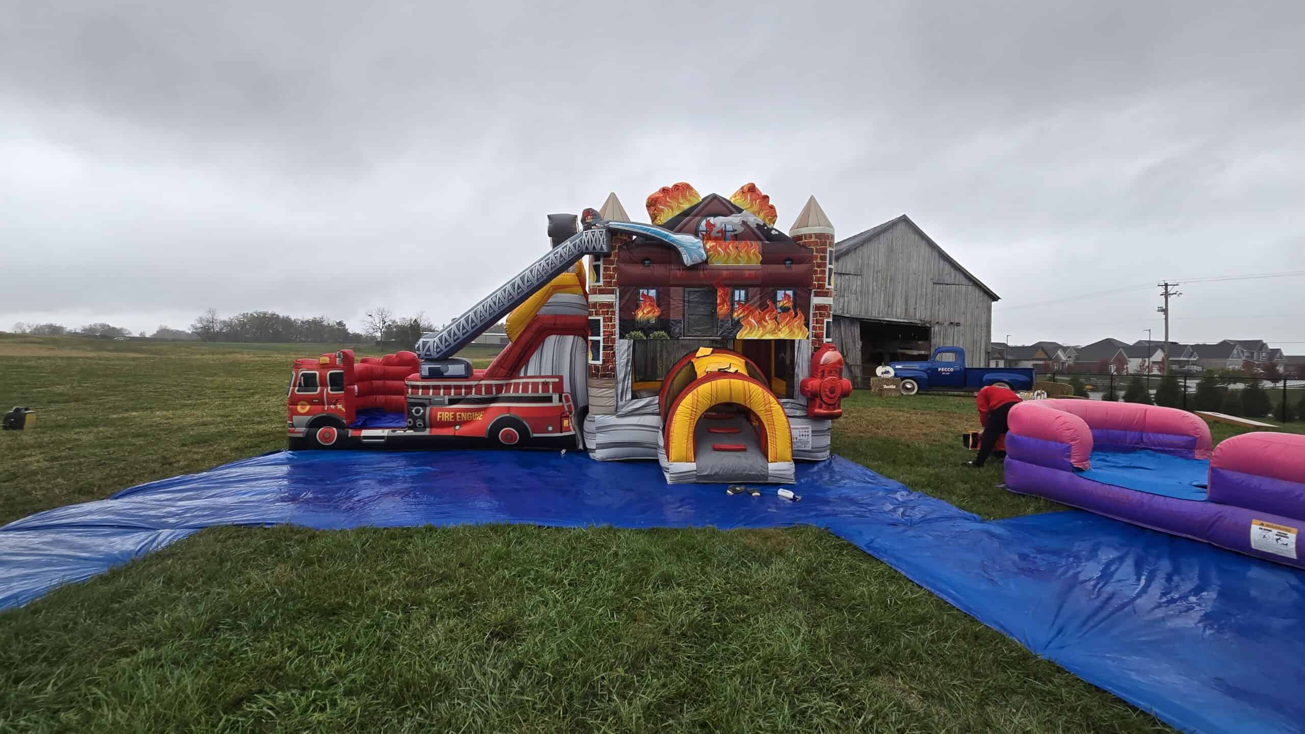 Engine 1 fire truck bounce house at a Central Kentucky family event