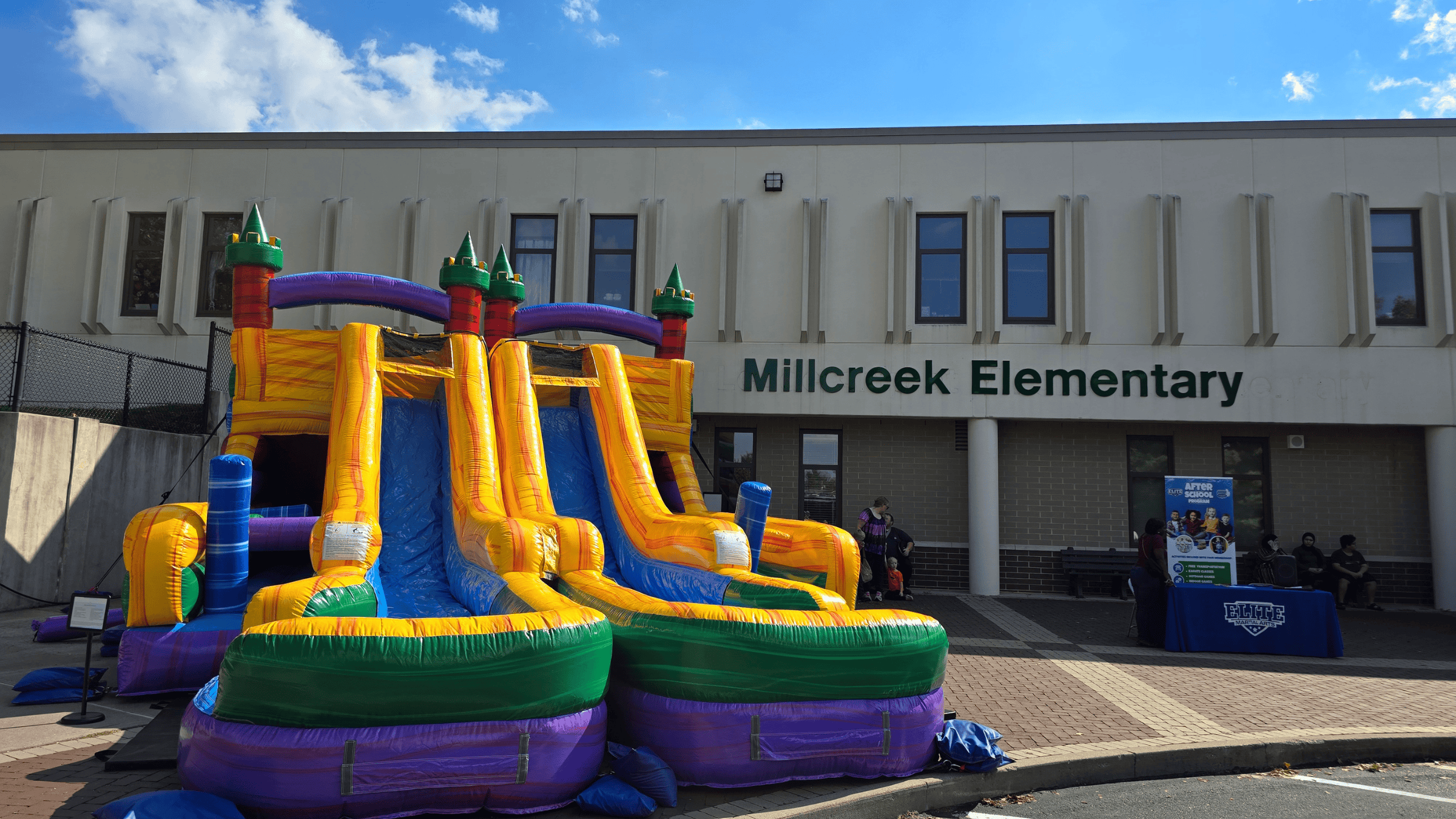 Castle Clash bounce house at an elementary school field day in Lexington KY