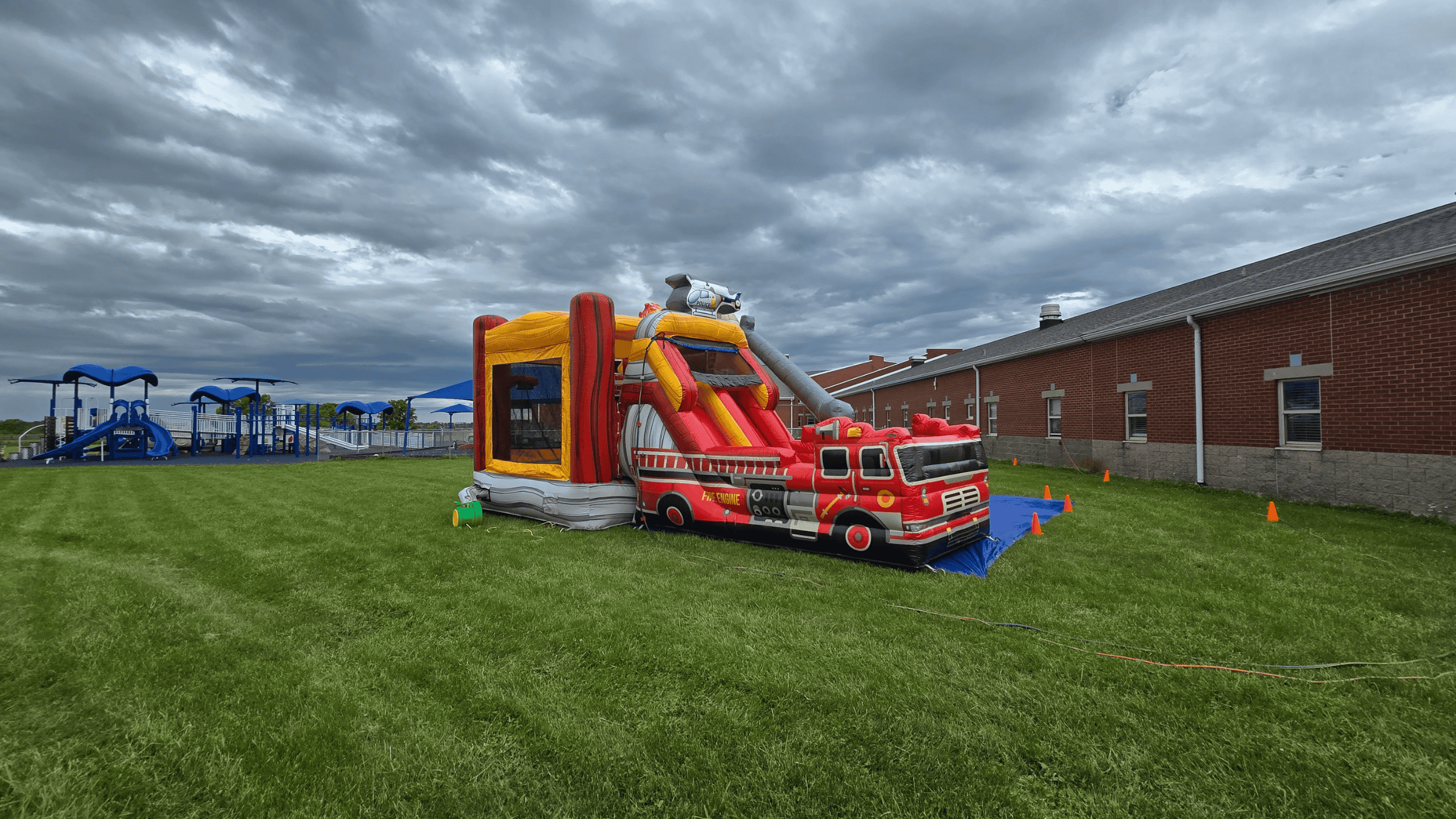 Engine 1 bounce house set up at a school event in Central Kentucky