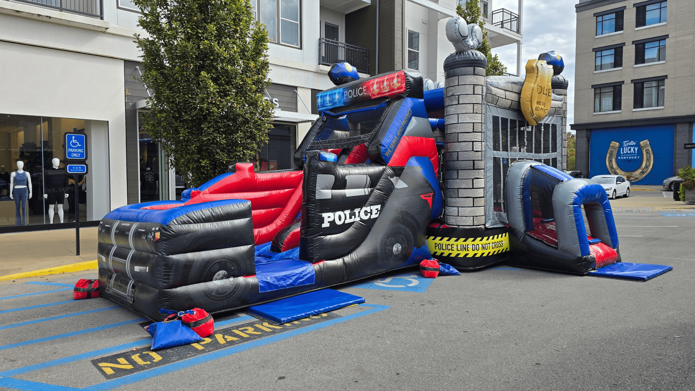 Police Cruiser bounce house at The Summit community event in Lexington KY