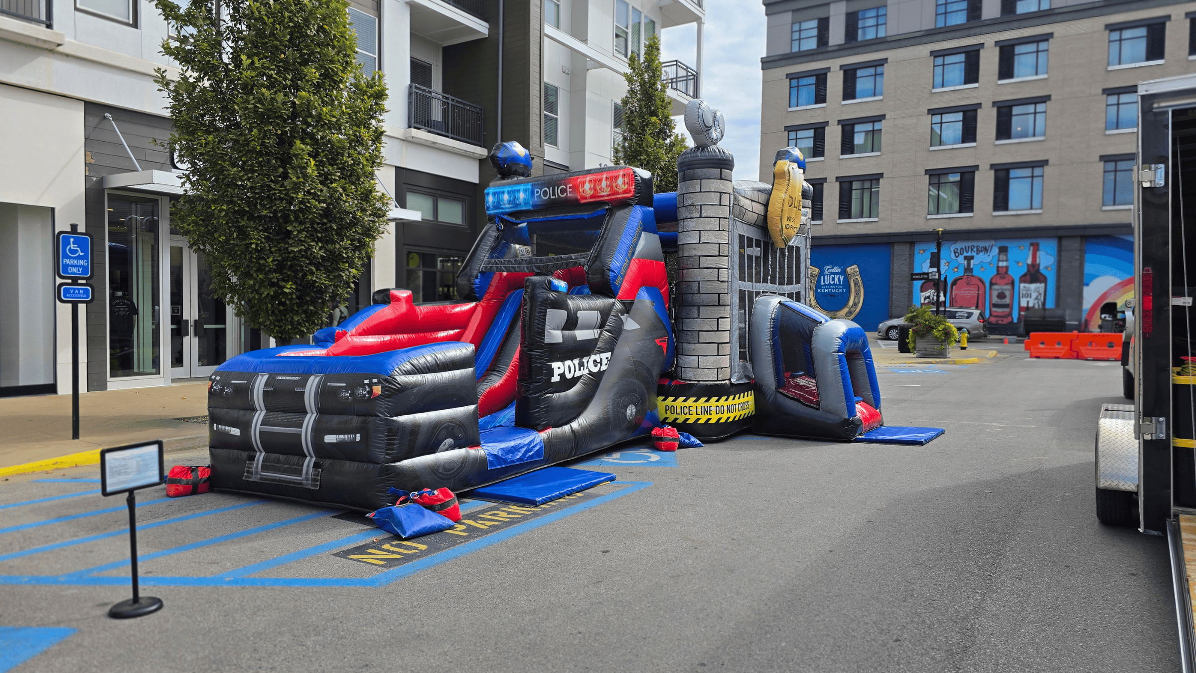 Police Cruiser bounce house at The Summit community event in Lexington KY