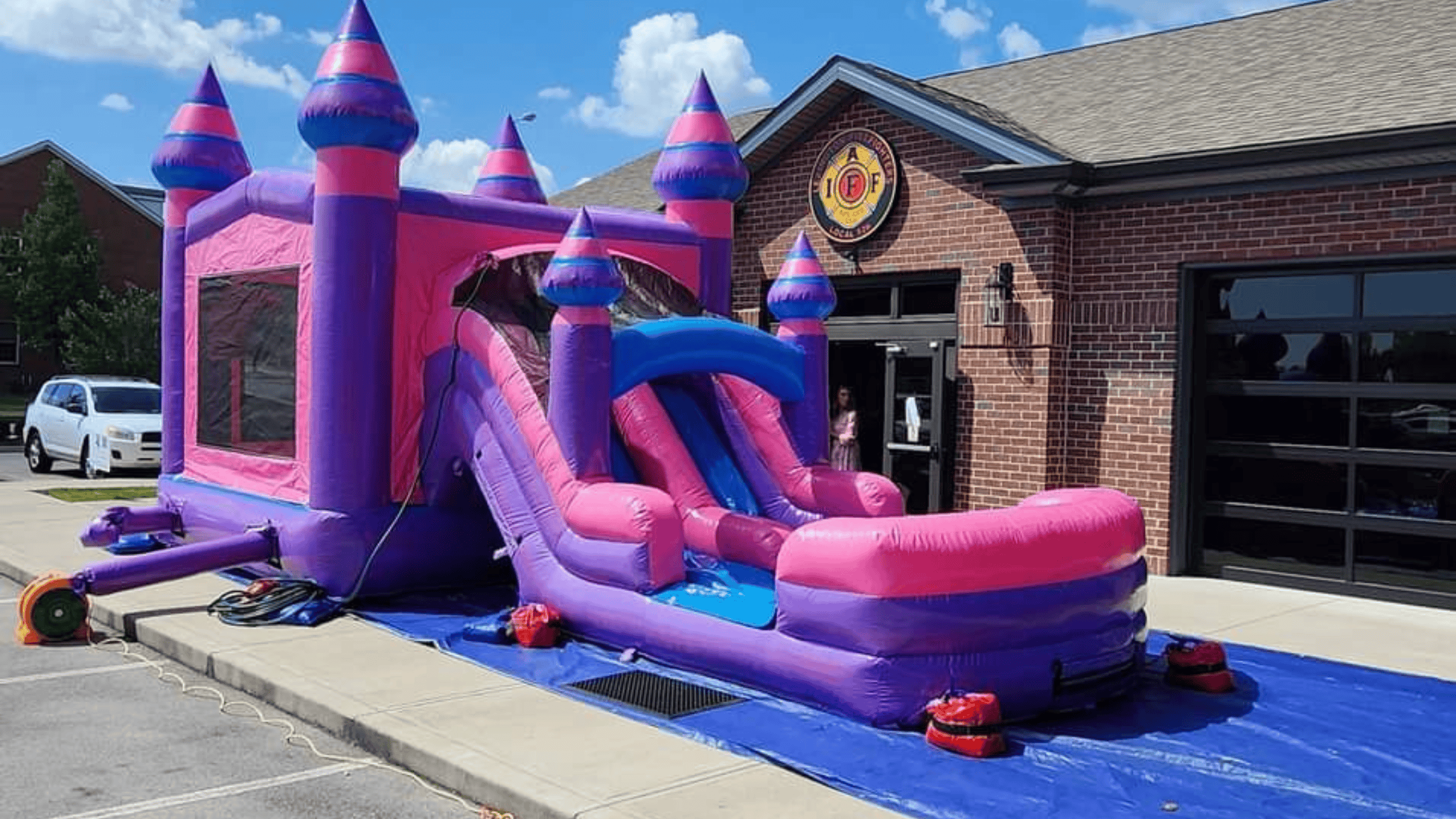Purplish bounce house at the Lexington Fraternal Order of Firefighters Union Hall